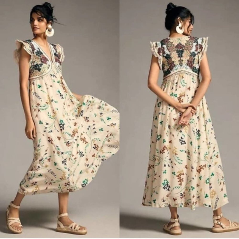 Anthropologie maxi dress with embroidered bodice and flutter sleeves.